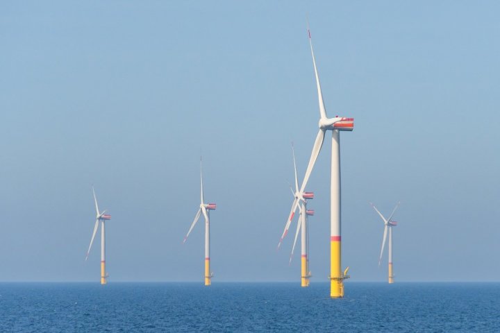 engineer hardhat wind farm clipboard